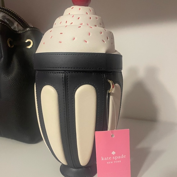kate spade Handbags - Kate Spade Cream and Black Crossbody Bag with Cupcake Design